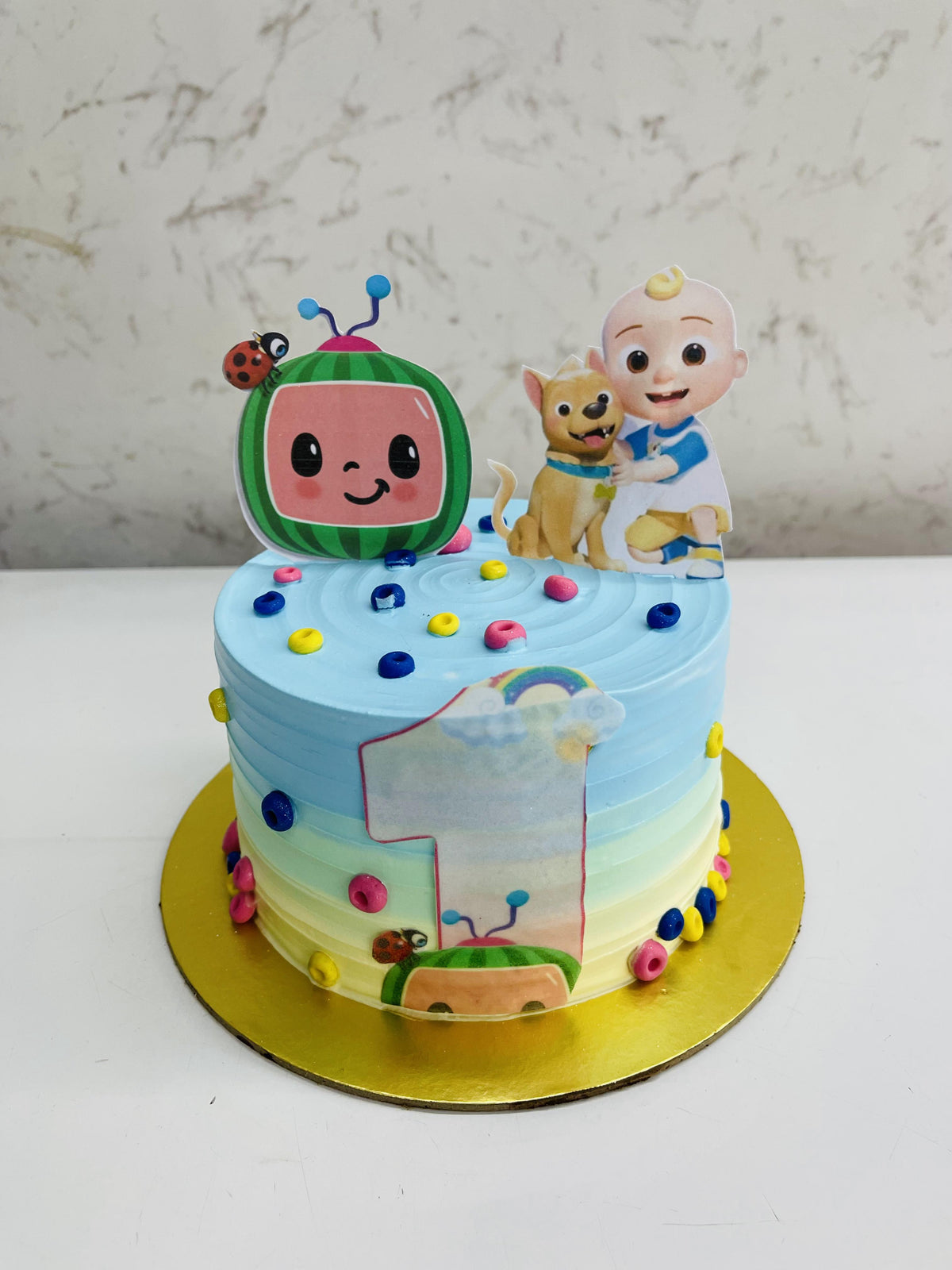 Coco melon Theme Cake