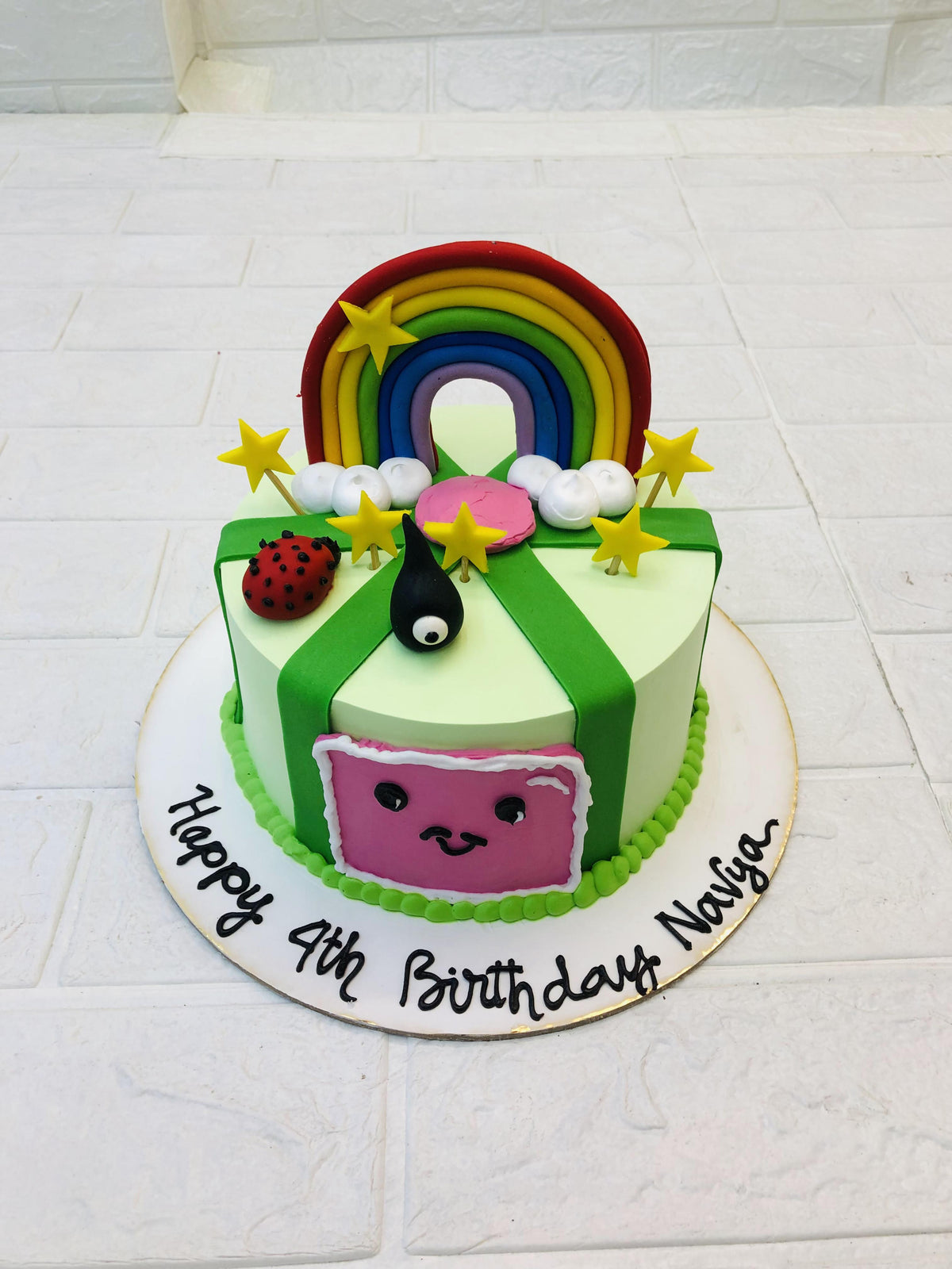 Smiley Rainbow Theme Cake