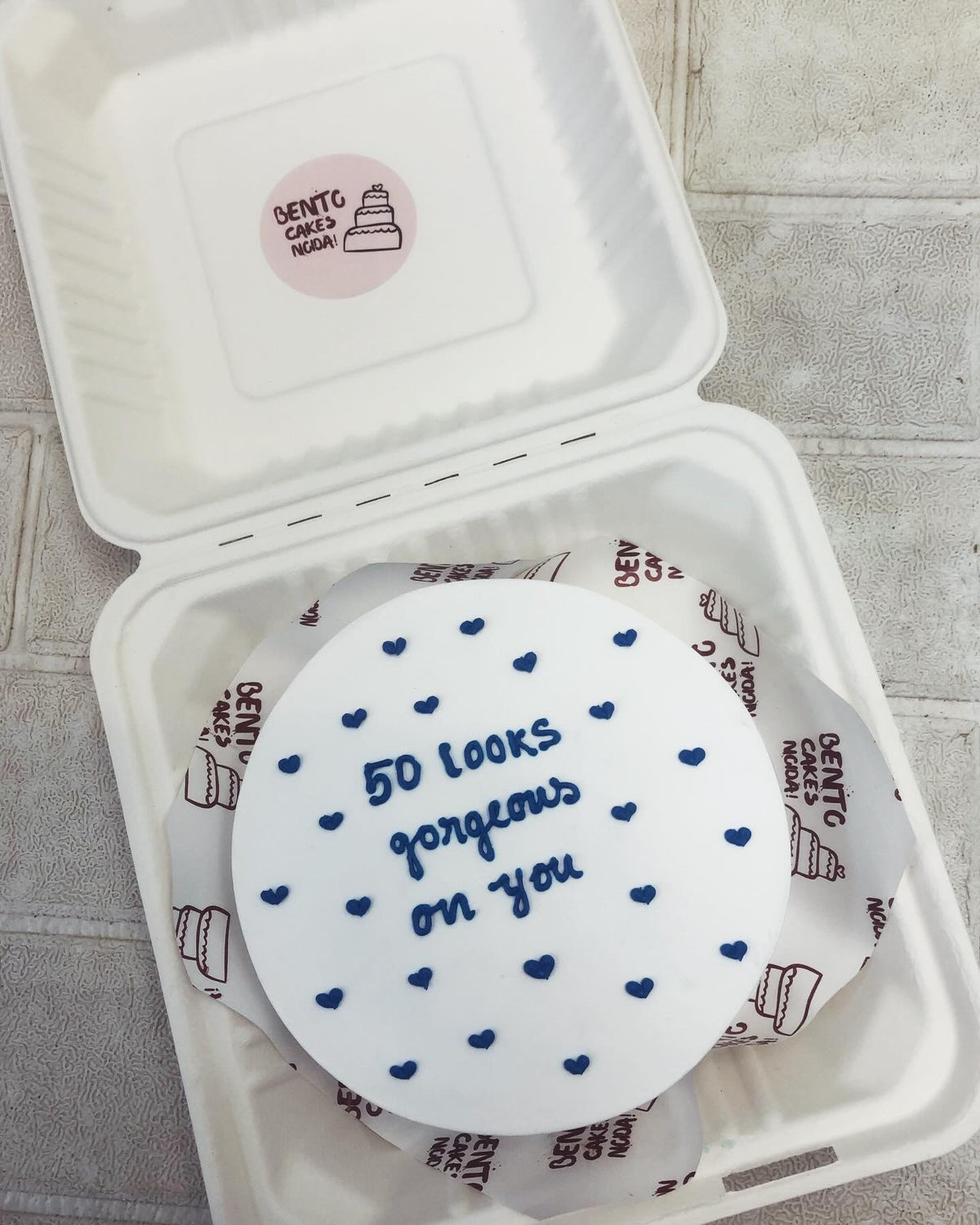 Blue Hearts On White Cake