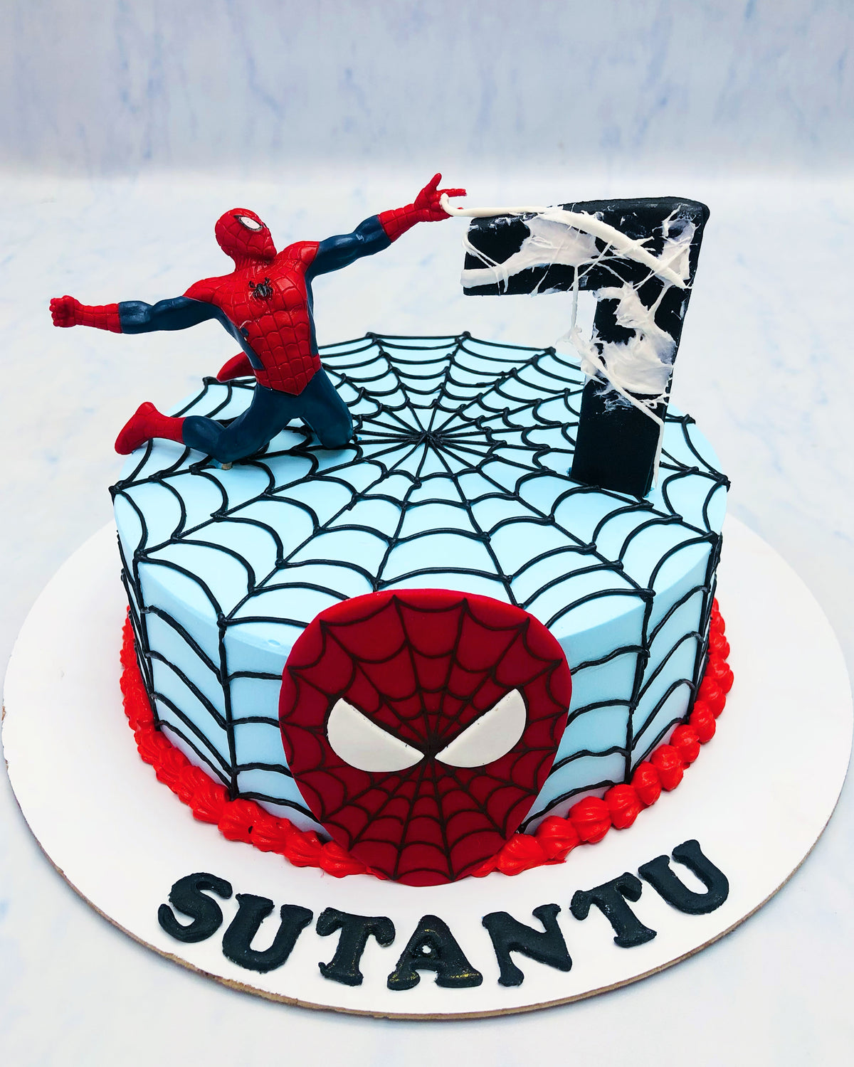 Spiderman Theme Light Blue Cake