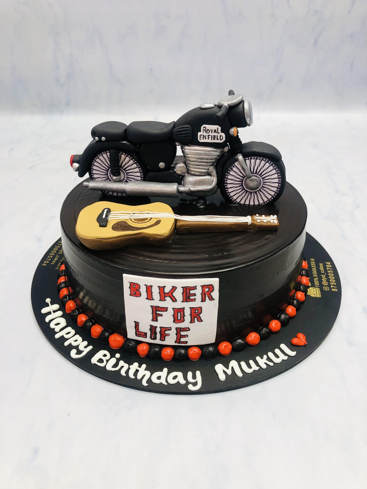 Black Bullet With Guitar on Black Cake