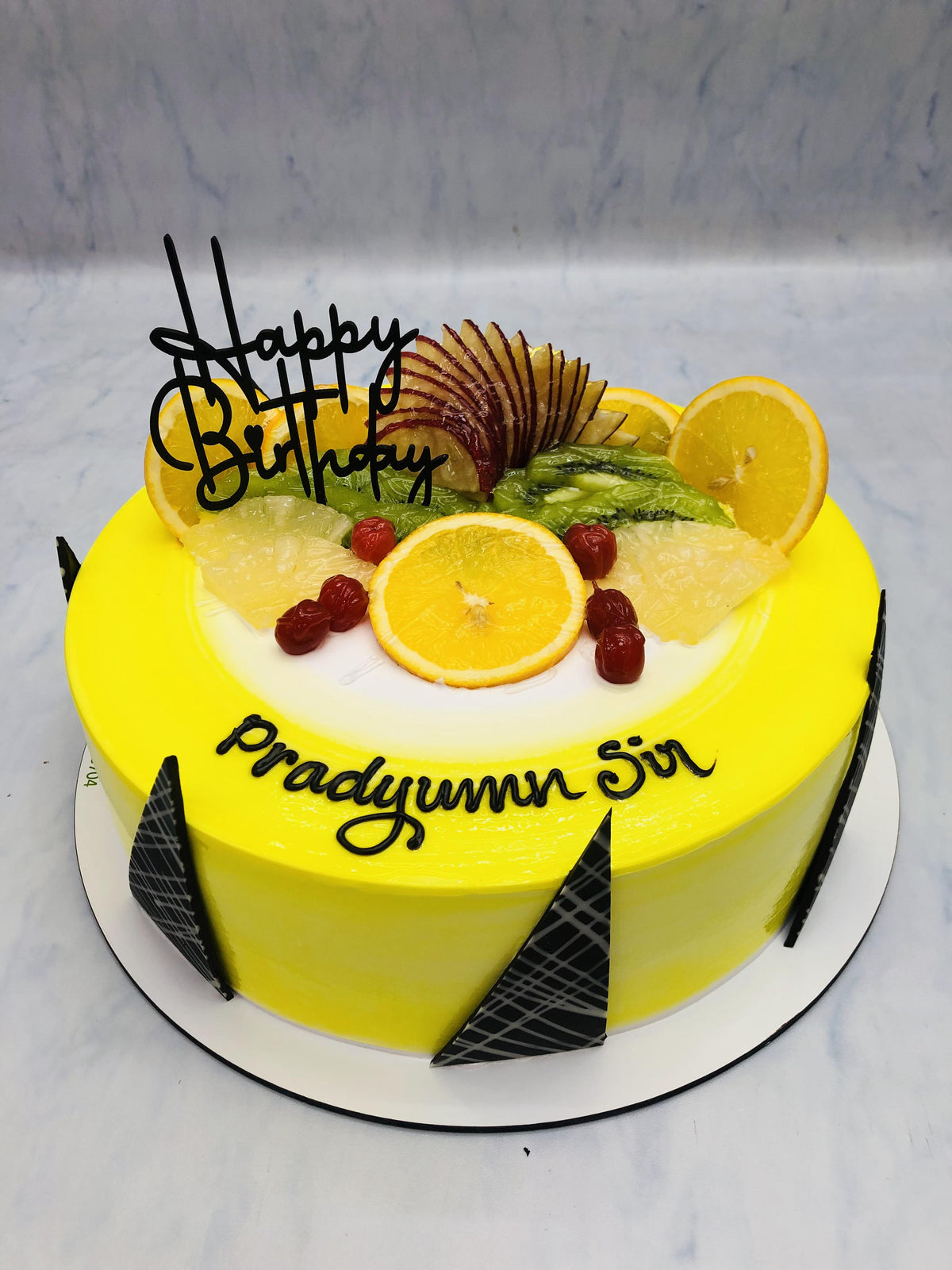 Yellow Decorative Fruits Cake