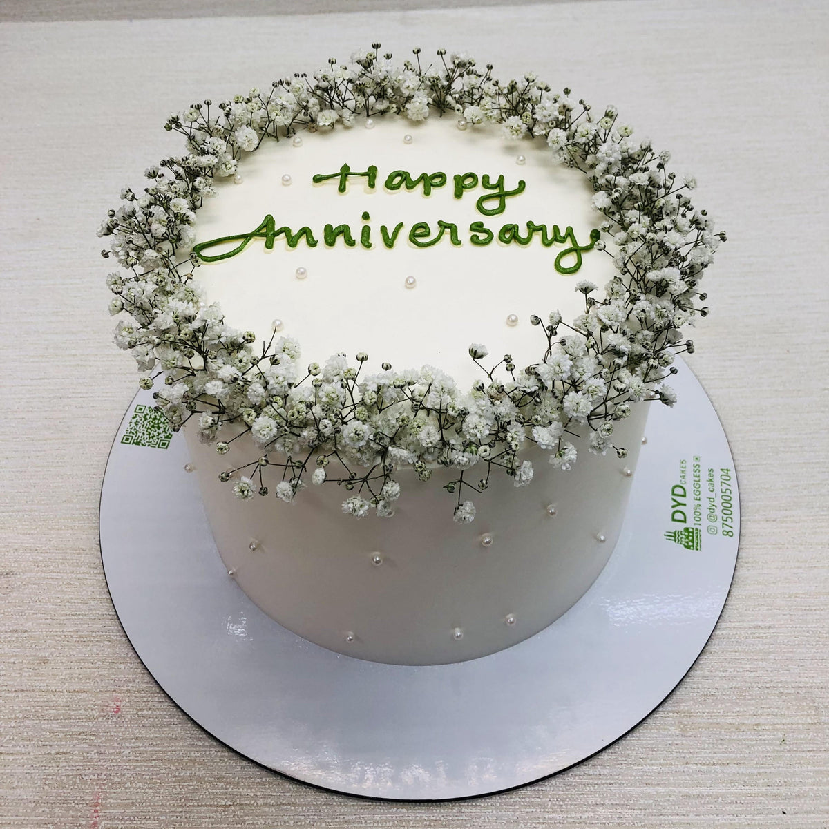 Basic Floral Theme White Anniversary Cake