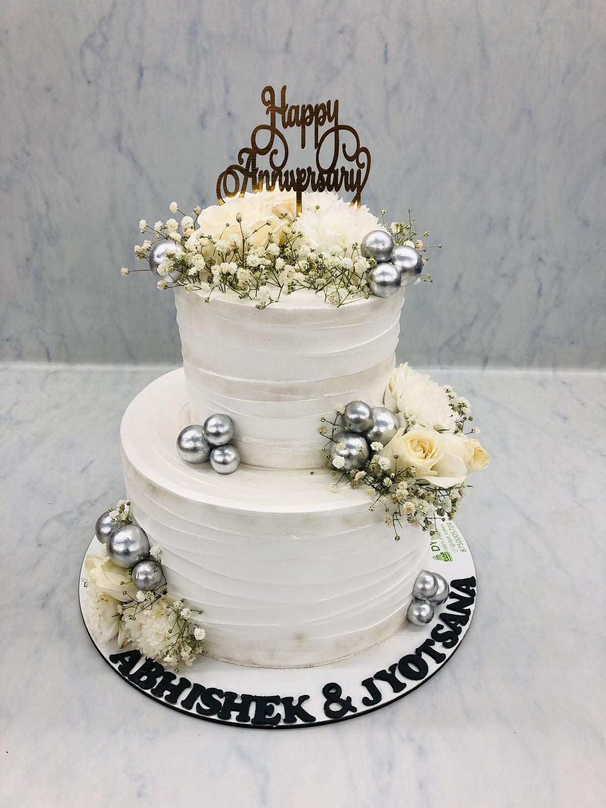 White Silver Anniversary Floral Cake