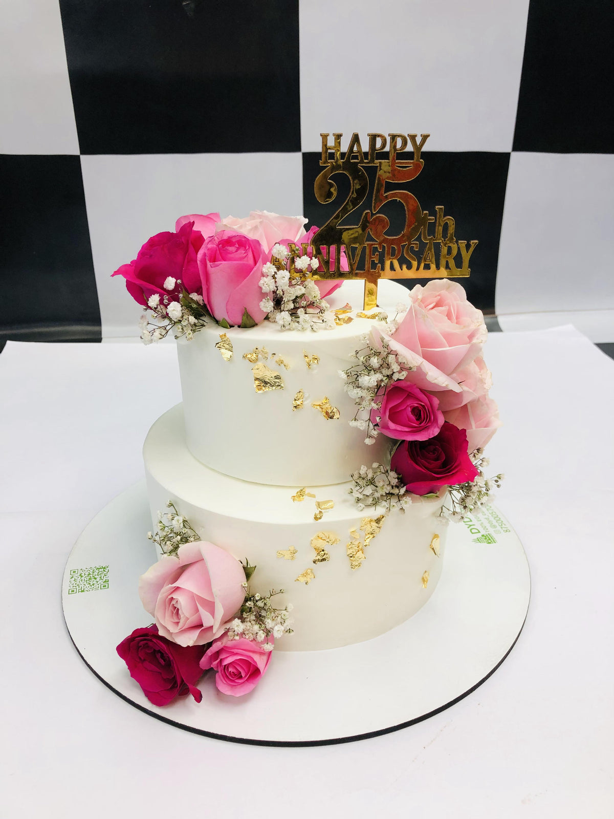 Pink Roses On White Anniversary Cake